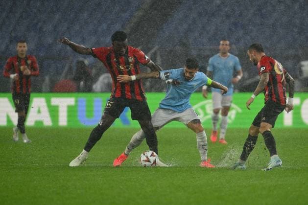 CALCIO - UEFA Europa League - SS Lazio vs OGC Nice Youssouf Ndayishimiye of O.G.C. Nice and Mattia Zaccagni of S.S. Lazio in action during the UEFA Europa League 2024 25 League Phase MD2 match between S.S. Lazio and O.G.C. Nice at Olympic Stadium on October 3, 2024 in Rome, Italy. Rome Italy  Copyright: xIPAxSport ABACAx