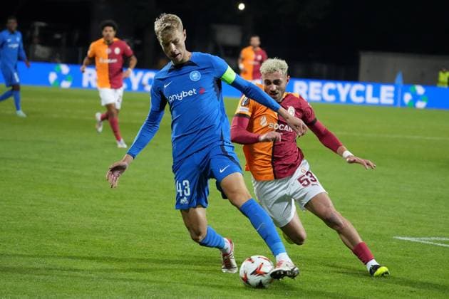 (241004) -- RIGA, Oct. 4, 2024 -- Ziga Lipuscek (L) of RFS vies with Baris Alper Yilmaz of Galatasaray during a UEFA Europa League match between RFS and Galatasaray in Riga, Latvia, Oct. 3, 2024. (Photo by Xinhua) (SP)LATVIA-RIGA-FOOTBALL-UEFA EUROPA LEAGUE-RFS VS GALATASARAY EdijsxPalens 