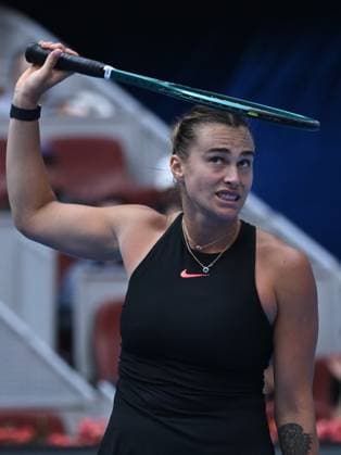 (241004) -- BEIJING, Oct. 4, 2024 -- Aryna Sabalenka reacts during the women s singles quarterfinal match between Karolina Muchova of the Czech Republic and Aryna Sabalenka of Belarus at the 2024 China Open tennis tournament in Beijing, China, Oct. 4, 2024 ) (SP)CHINA-BEIJING-TENNIS-CHINA OPEN-WOMEN S SINGLES(CN) ZhangxLong 