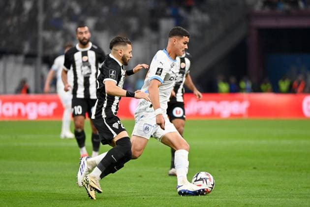 Olympique de Marseille v Angers SCO - Ligue 1 McDonald s 2024 2025 28 Farid EL MELALI (sco) - 07 Valentin CARBONI (om) during the Ligue 1 McDonald s match between Marseille and Angers at Orange Velodrome on October 4, 2024 in Marseille, France. Marseille France  Copyright: xFEPx 776218675