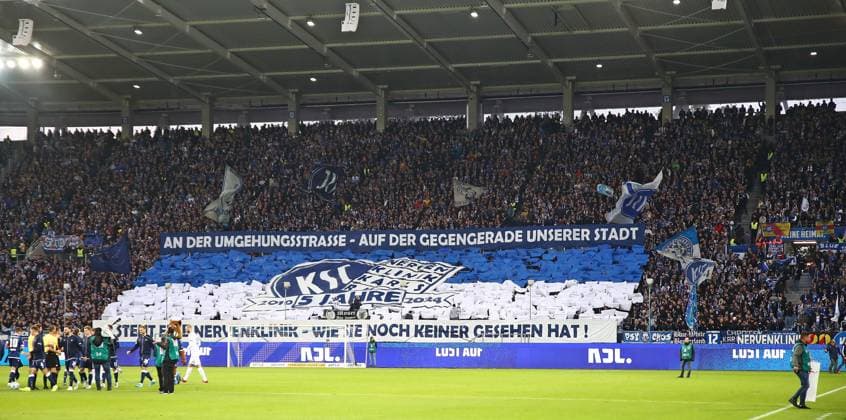 04.10.2024, xmohx, Fussball 2.Bundesliga, Karlsruher SC - SV Darmstadt 98 emspor, v.l. Choreographie Karslruher SC Fans (DFL DFB REGULATIONS PROHIBIT ANY USE OF PHOTOGRAPHS as IMAGE SEQUENCES and or QUASI-VIDEO) Karlsruhe