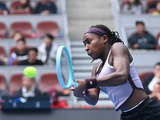 (241005) -- BEIJING, Oct. 5, 2024 -- Coco Gauff of the United States hits a return during the women s singles semifinal match against Paula Badosa of Spain at the 2024 China Open tennis tournament in Beijing, China, Oct. 5, 2024. ) (SP)CHINA-BEIJING-TENNIS-CHINA OPEN-WOMEN S SINGLES (CN) ZhangxLong 