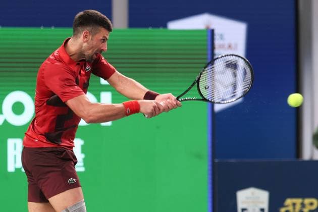 (241005) -- SHANGHAI, Oct. 5, 2024 -- Novak Djokovic hits a return during the men s singles round of 64 match between Alex Michelsen of the United States and Novak Djokovic of Serbia at the ATP, Tennis Herren World Tour Shanghai Masters tennis tournament in Shanghai, east China, Oct. 5, 2024. ) (SP)CHINA-SHANGHAI-TENNIS-ATP TOUR-SHANGHAI MASTERS(CN) WangxXiang 