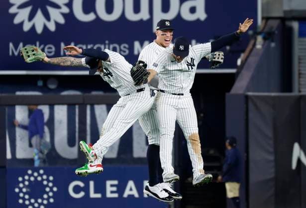 New York Yankees Alex Verdugo, Aaron Judge and Juan Soto celebrate after the game against the Kansas City Royals in game one of the ALDS at Yankee Stadium on Saturday, October 5, 2024 in New York City. The Yankees defeated the Royals 6-5 and lead the best of 5 series 1-0.  NYP20241005131 JOHNxANGELILLO