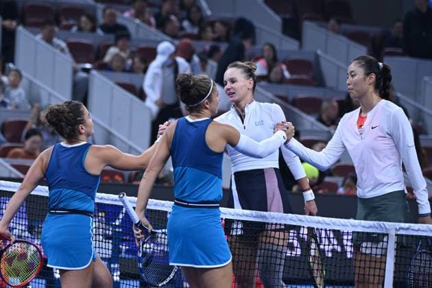 (241006) -- BEIJING, Oct. 6, 2024 -- Sara Errani (2nd L) Jasmine Paolini(1st L) of Italy and Chan Hao-Ching (1st R) of Chinese Taipei Veronica Kudermetova of Russia shake hands after the women s doubles final at the 2024 China Open tennis tournament in Beijing, China, Oct. 6, 2024. ) (SP)CHINA-BEIJING-TENNIS-CHINA OPEN-WOMEN S DOUBLES-FINAL (CN) ZhangxLong 