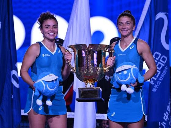 (241006) -- BEIJING, Oct. 6, 2024 -- Winners Sara Errani(R) Jasmine Paolini of Italy celebrate with the trophy after winning the women s doubles final against Chan Hao-Ching of Chinese Taipei Veronica Kudermetova of Russia at the 2024 China Open tennis tournament in Beijing, China, Oct. 6, 2024. ) (SP)CHINA-BEIJING-TENNIS-CHINA OPEN-WOMEN S DOUBLES-FINAL (CN) ZhangxLong 