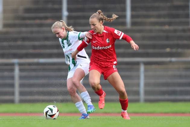 Mia Eickmann (Borussia Mönchengladbach) und Annalena Heck (SC Freiburg U20) im Zweikampf waehrend des Spiels der 2. Frauen Bundesliga zwischen Borussia Mönchengladbach und SC Freiburg, Grenzlandstadion am 06. October 2024 in Mönchengladbach, Deutschland. (Foto von Oliver Kaelke DeFodi Images) +++ Mia Eickmann (Borussia Mönchengladbach) und Annalena Heck (SC Freiburg U20) battle for the ball during the 2. Frauen Bundesliga match between Borussia Mönchengladbach and SC Freiburg at Grenzlandstadium on October 6, 2024 in Mönchengladbach, Germany. (Photo by Oliver Kaelke DeFodi Images) DFL regulations prohibit any use of photographs as image sequences and or quasi-video. Defodi-003_678_2024_10_06_OK_BMGSCF_0129