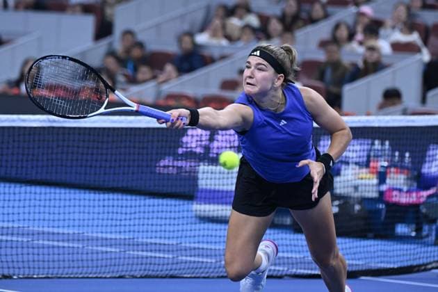 (241006) -- BEIJING, Oct. 6, 2024 -- Karolina Muchova of the Czech Republic hits a return during the women s singles final match against Coco Gauff of the United States at the 2024 China Open tennis tournament in Beijing, China, Oct. 6, 2024. ) (SP)CHINA-BEIJING-TENNIS-CHINA OPEN-WOMEN S SINGLES-FINAL (CN) ZhangxLong 