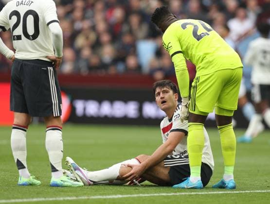 Football - 2024 2025 Premier League - Aston Villa vs Manchester United, ManU - Villa Park - Sunday 6th October 2024 Harry Maguire of Manchester United lies injured and looks dejected