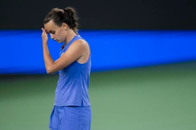 (241007) -- WUHAN, Oct. 7, 2024 -- Clara Burel of France reacts during the women s singles round of 64 match against Yuan Yue of China at the 2024 Wuhan Open tennis tournament in Wuhan, capital of central China s Hubei Province, Oct. 7, 2024. ) (SP)CHINA-WUHAN-TENNIS-WUHAN OPEN-WOMEN S SINGLES (CN) WuxZhizun 