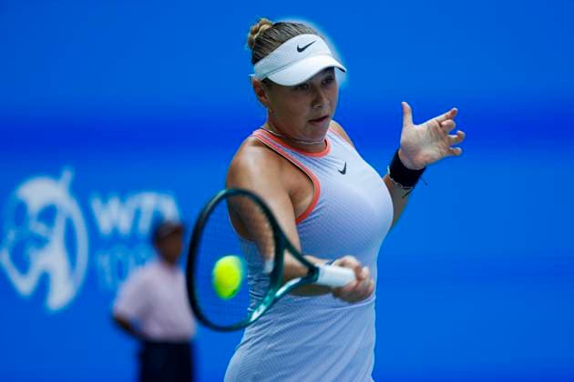 WUHAN, CHINA - OCTOBER 08: Amanda Anisimova of United States competes in the Women s Singles Round of 64 match against Cristina Bucsa of Spain on day four of 2024 Wuhan Open at Optics Valley International Tennis Center on October 8, 2024 in Wuhan, Hubei Province of China.  Copyright: xVCGx 111522566578