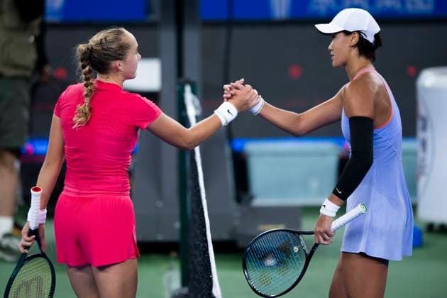 (241008) -- WUHAN, Oct. 8, 2024 -- Wang Xiyu (R) of China greets Andreeva Mirra of Russia during the women s singles round of 64 match at the 2024 Wuhan Open tennis tournament in Wuhan, capital of central China s Hubei Province, Oct. 8, 2024. ) (SP)CHINA-WUHAN-TENNIS-WUHAN OPEN-WOMEN S SINGLES (CN) WuxZhizun 