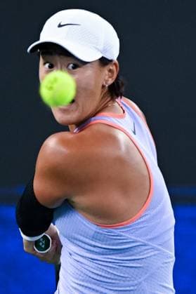 (241008) -- WUHAN, Oct. 8, 2024 -- Wang Xiyu of China hits a return during the women s singles round of 64 match against Andreeva Mirra of Russia at the 2024 Wuhan Open tennis tournament in Wuhan, capital of central China s Hubei Province, Oct. 8, 2024. ) (SP)CHINA-WUHAN-TENNIS-WUHAN OPEN-WOMEN S SINGLES (CN) WuxZhizun 