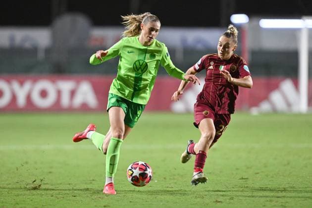 8th October 2024; Stadio Tre Fontane, Rome, Italy; UEFA Womens Champions League Football, Roma versus Wolsburg; Jule Brand of Wolfsburg breaks away from Giada Greggi of AS Roma  ActionPlus12701635 AllShotLive