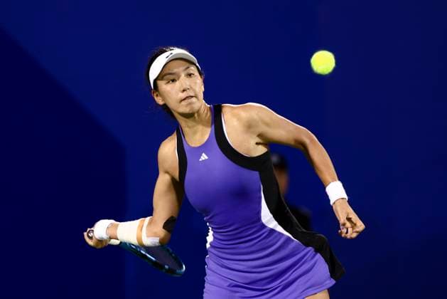 WUHAN, CHINA - OCTOBER 09: Wang Xinyu of China competes in the Women s Singles Round of 32 match against Lucia Bronzetti of Italy on day five of 2024 Wuhan Open at Optics Valley International Tennis Center on October 9, 2024 in Wuhan, Hubei Province of China.  Copyright: xVCGx 111522766513