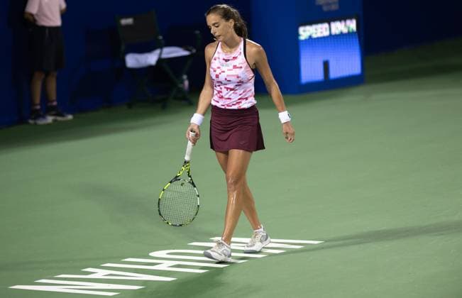 (241009) -- WUHAN, Oct. 9, 2024 -- Lucia Bronzetti reacts during the women s singles round of 32 match between Wang Xinyu of China and Lucia Bronzetti of Italy at the 2024 Wuhan Open tennis tournament in Wuhan, capital of central China s Hubei Province, Oct. 9, 2024. ) (SP)CHINA-WUHAN-TENNIS-WUHAN OPEN-WOMEN S SINGLES(CN) HuxJingwen 