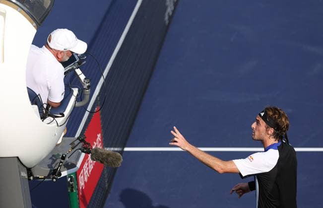 (241009) -- SHANGHAI, Oct. 9, 2024 -- Stefanos Tsitsipas communicates with referee during the men s singles round of 16 match between Daniil Medvedev of Russia and Stefanos Tsitsipas of Greece at the ATP, Tennis Herren World Tour Shanghai Masters tennis tournament in Shanghai, east China, Oct. 9, 2024. ) (SP)CHINA-SHANGHAI-TENNIS-ATP TOUR-SHANGHAI MASTERS(CN) BaixXuefei 