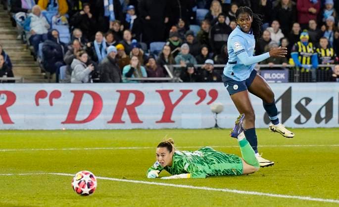 Manchester, England, 9th October 2024. Khadija Shaw of Manchester City (R) scores the second goal during the UEFA Womens Champions League match at the Academy Stadium, Manchester. Picture credit should read: Andrew Yates Sportimage EDITORIAL USE ONLY. No use with unauthorised audio, video, data, fixture lists, club league logos or live services. Online in-match use limited to 120 images, no video emulation. No use in betting, games or single club league player publications. SPI-3368-0016