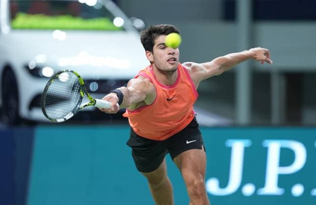 (241010) -- SHANGHAI, Oct. 10, 2024 -- Carlos Alcaraz hits a return during the men s singles quarterfinal match between Carlos Alcaraz of Spain and Tomas Machac of the Czech Republic at the ATP, Tennis Herren World Tour Shanghai Masters tennis tournament in Shanghai, east China, Oct. 10, 2024. ) (SP)CHINA-SHANGHAI-TENNIS-ATP TOUR-SHANGHAI MASTERS(CN) BaixXuefei 