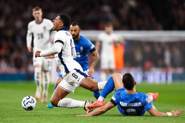 England v Greece 10 October 2024, London - UEFA Nations League - England v Greece - Jude Bellingham of England is tackled by Konstantinos Koulierakis of Greece - Photo: Jacques Feeney Offside. London UK Copyright: xJacquesxFeeneyx xOffsidexOffside