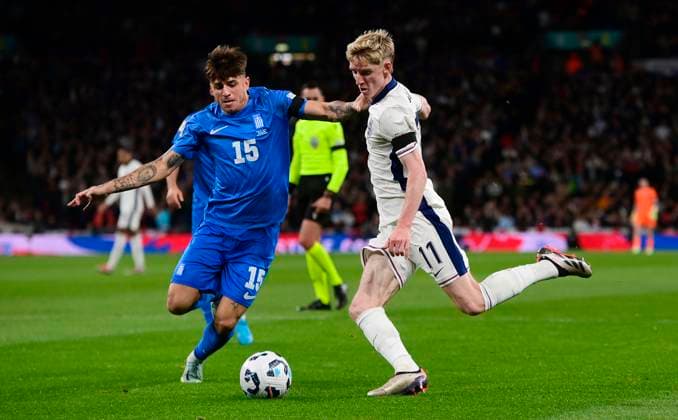 England v Greece, London, UK - 10 Oct 2024 Anthony Gordon of England challenges for the ball with Lazaros Rota of Greece during the UEFA Nations League match between England and Greece on 10th October 2024 at Wembley Stadium, London London Wembley Stadium London GBR Copyright: xFrankiexOKeeffe PPAUKx PPA-141736