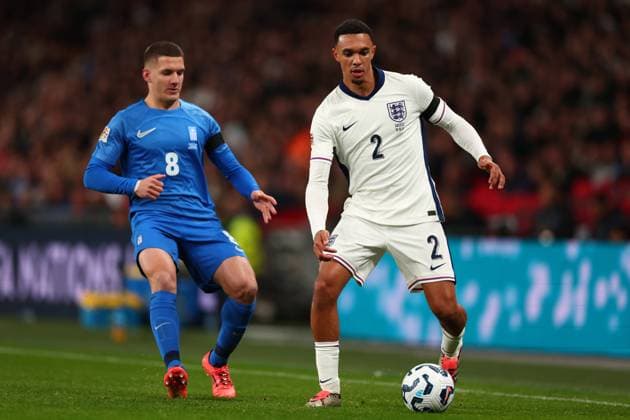 10th October 2024; Wembley Stadium, London, England; Nations League, League B, Group 2 International Football, England versus Greece; Trent Alexander-Arnold of England is forced backwards under pressure from Christos Tzolis of Greece  ActionPlus12702212 ShaunxBrooks