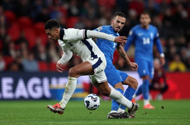 Jude Bellingham of England with Dimitrios Kourbelis of Greece England v Greece - UEFA Nations League - League B - Group 2. Football. Wembey Stadium, London. UK. 10 OCT 2024 Editorial use only  Copyright: xJASONPIX Shutterstockx 14774704q