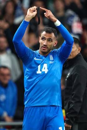 England v Greece 10 October 2024, London - International Football, UEFA Nation™s League - England v Greece - Vangelis Pavlidis of Greece celebrates scoring the opening goal by pointing to his black armband, worn in memory of teammate George Baldock - Photo: Charlotte Wilson Offside. London UK Copyright: xCharlottexWilsonx xOffsidexOffside