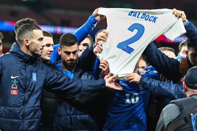 England v Greece 10 October 2024, London - International Football, UEFA Nation™s League - England v Greece - The Greece players hold up a shirt bearing George Baldock™s name and number after their victory over England - Photo: Charlotte Wilson Offside. London UK Copyright: xCharlottexWilsonx xOffsidexOffside