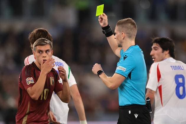 Rome, Italy, 10th October 2024. Leandro Trossard of Belgium reacts in disbelief as he is shown a yellow card by The Referee Espen Eskas of Norway following a clash with Gianluigi Donnarumma of Italy during the UEFA Nations League match at Stadio Olimpico, Rome. Picture credit should read: Jonathan Moscrop Sportimage EDITORIAL USE ONLY. No use with unauthorised audio, video, data, fixture lists, club league logos or live services. Online in-match use limited to 120 images, no video emulation. No use in betting, games or single club league player publications. SPI-3351-0064