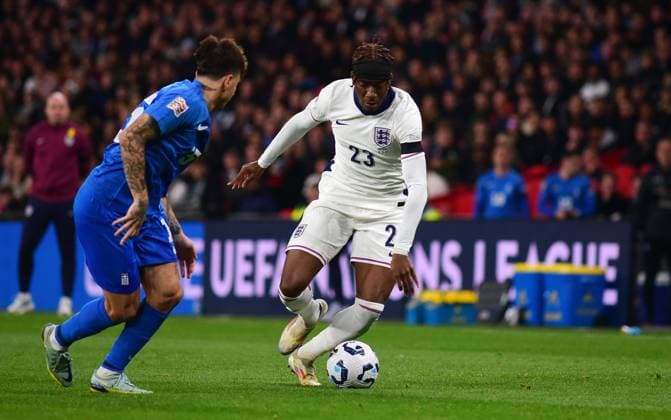 England v Greece, London, UK - 10 Oct 2024 Noni Madueke of England challenges for the ball with Lazaros Rota of Greece during the UEFA Nations League match between England and Greece on 10th October 2024 at Wembley Stadium, London London Wembley Stadium London GBR Copyright: xFrankiexOKeeffe PPAUKx PPA-141957