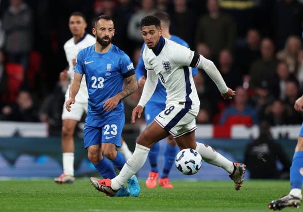 Jude Bellingham of England with Manolis Siopis of Greece England v Greece - UEFA Nations League - League B - Group 2. Football. Wembey Stadium, London. UK. 10 OCT 2024 Editorial use only  Copyright: xJASONPIX Shutterstockx 14774704fr