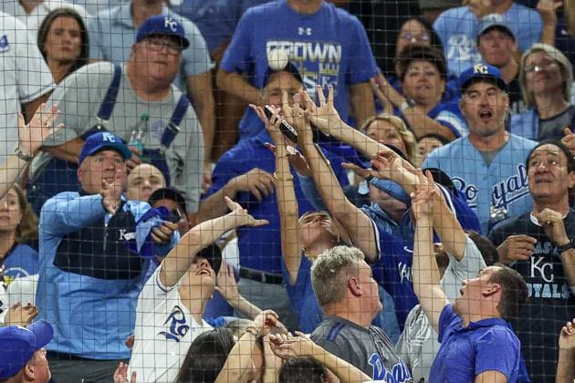 October 10, 2024: Fans try to catch a foul ball from New York Yankees designated hitter Giancarlo Stanton (27, not shown, during the second inning of game 4 of the American League Division Series against the Kansas City Royals at Kauffman Stadium in Kansas City, MO. CSM Kansas City United States of America - ZUMAc04_ 20241010_zma_c04_014 Copyright: xDavidxSmithx