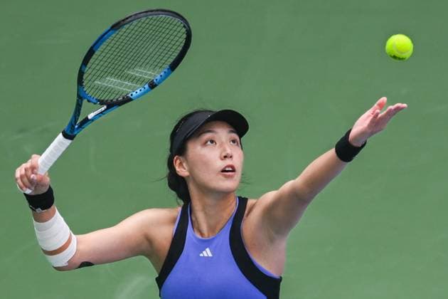 (241011) -- WUHAN, Oct. 11, 2024 -- Wang Xinyu serves during the women s singles quarterfinal between Wang Xinyu of China and Ekaterina Alexandrova of Russia at the 2024 Wuhan Open tennis tournament in Wuhan, capital of central China s Hubei Province, Oct. 11, 2024. ) (SP)CHINA-WUHAN-TENNIS-WUHAN OPEN-WOMEN S SINGLES (CN) DuxZixuan 