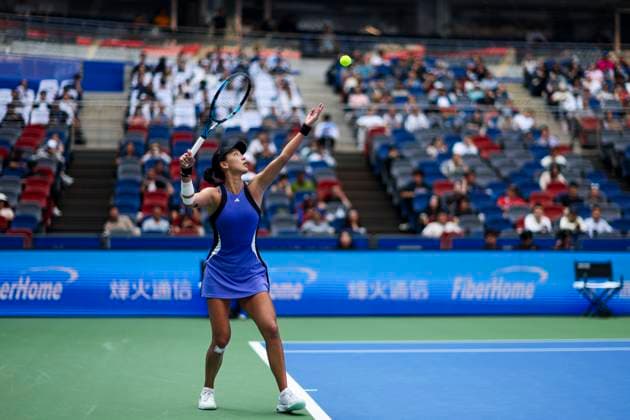 WUHAN, CHINA - OCTOBER 11: Wang Xinyu of China competes in the Women s Singles Quarterfinal match against Ekaterina Alexandrova of Russia on day seven of 2024 Wuhan Open at Optics Valley International Tennis Center on October 11, 2024 in Wuhan, Hubei Province of China.  Copyright: xVCGx 111523201073
