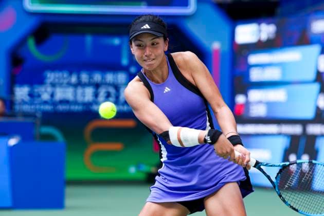 WUHAN, CHINA - OCTOBER 11: Wang Xinyu of China competes in the Women s Singles Quarterfinal match against Ekaterina Alexandrova of Russia on day seven of 2024 Wuhan Open at Optics Valley International Tennis Center on October 11, 2024 in Wuhan, Hubei Province of China.  Copyright: xVCGx 111523196661