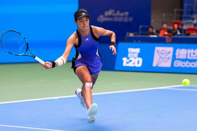 WUHAN, CHINA - OCTOBER 11: Wang Xinyu of China competes in the Women s Singles Quarterfinal match against Ekaterina Alexandrova of Russia on day seven of 2024 Wuhan Open at Optics Valley International Tennis Center on October 11, 2024 in Wuhan, Hubei Province of China.  Copyright: xVCGx 111523196651