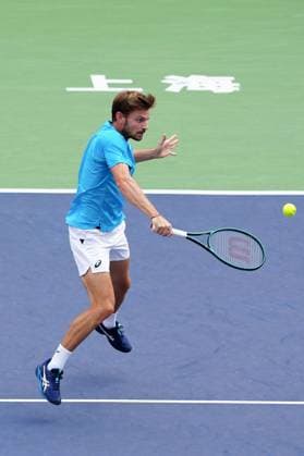 (241011) -- SHANGHAI, Oct. 11, 2024 -- David Goffin hits a return during the men s singles quarterfinal match between Taylor Fritz of the United States and David Goffin of Belgium at the ATP, Tennis Herren World Tour Shanghai Masters tennis tournament in Shanghai, east China, Oct. 11, 2024. ) (SP)CHINA-SHANGHAI-TENNIS-ATP TOUR-SHANGHAI MASTERS(CN) XuxYanan 
