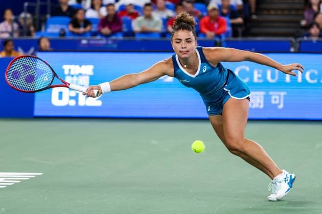 WUHAN, CHINA - OCTOBER 11: Jasmine Paolini of Italy competes in the Women s Singles Quarterfinal match against Zheng Qinwen of China on day seven of 2024 Wuhan Open at Optics Valley International Tennis Center on October 11, 2024 in Wuhan, Hubei Province of China.  Copyright: xVCGx 111523242544