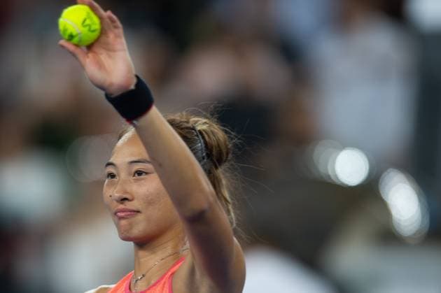 (241011) -- WUHAN, Oct. 11, 2024 -- Zheng Qinwen celebrates after the women s singles quarterfinal match between Zheng Qinwen of China and Jasmine Paolini of Italy at the 2024 Wuhan Open tennis tournament in Wuhan, capital of central China s Hubei Province, Oct. 11, 2024. ) (SP)CHINA-WUHAN-TENNIS-WUHAN OPEN-WOMEN S SINGLES (CN) XiaoxYijiu 