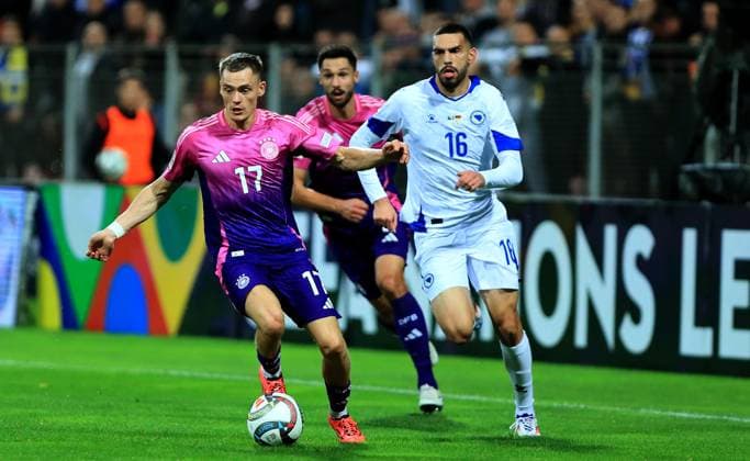 11.10.2024 Zenica Bosnia and Herzegovina-Germany Uefa nations league men s football Florian Wirtz(L) Germany, Adrian Leon Barisic(R) Bosnia and Herzegovina :Str