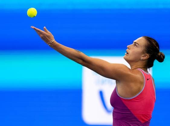 (241012) -- WUHAN, Oct. 12, 2024 -- Aryna Sabalenka serves during the women s singles semifinal match between Aryna Sabalenka of Belarus and Coco Gauff of the United States at the 2024 Wuhan Open tennis tournament in Wuhan, central China s Hubei Province, Oct. 12, 2024. ) (SP)CHINA-WUHAN-TENNIS-WUHAN OPEN-WOMEN S SINGLES (CN) HuxJingwen 