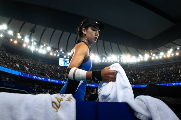 (241012) -- WUHAN, Oct. 12, 2024 -- Wang Xinyu reacts during the women s singles semifinal match between Zheng Qinwen of China and Wang Xinyu of China at the 2024 Wuhan Open tennis tournament in Wuhan, central China s Hubei Province, Oct. 12, 2024. ) (SP)CHINA-WUHAN-TENNIS-WUHAN OPEN-WOMEN S SINGLES (CN) XiaoxYijiu 