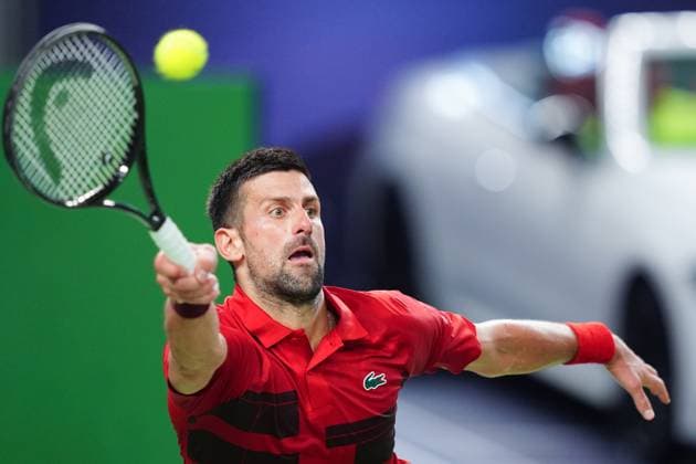 (241012) -- SHANGHAI, Oct. 12, 2024 -- Novak Djokovic hits a return during the men s singles semifinal match between Taylor Fritz of the United States and Novak Djokovic of Serbia at the ATP, Tennis Herren World Tour Shanghai Masters tennis tournament in Shanghai, east China, Oct. 12, 2024. ) (SP)CHINA-SHANGHAI-TENNIS-ATP TOUR-SHANGHAI MASTERS(CN) XuxYanan 