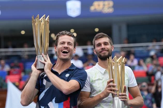 (241013) -- SHANGHAI, Oct. 13, 2024 -- Winner Wesley Koolhof (L) of the Netherlands Nikola Mektic of Croatia celebrate during the awarding ceremony for the men s doubles at the ATP, Tennis Herren World Tour Shanghai Masters tennis tournament in Shanghai, east China, Oct. 13, 2024. ) (SP)CHINA-SHANGHAI-TENNIS-ATP TOUR-SHANGHAI MASTERS(CN) XuxYanan 