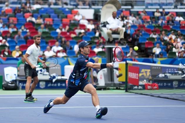 (241013) -- SHANGHAI, Oct. 13, 2024 -- Wesley Koolhof (R) of the Netherlands Nikola Mektic of Croatia compete against Maximo Gonzalez Andres Molteni of Argentina during the men s doubles final match at the ATP, Tennis Herren World Tour Shanghai Masters tennis tournament in Shanghai, east China, Oct. 13, 2024. ) (SP)CHINA-SHANGHAI-TENNIS-ATP TOUR-SHANGHAI MASTERS(CN) XuxYanan 