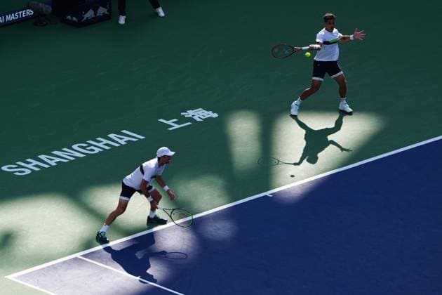 (241013) -- SHANGHAI, Oct. 13, 2024 -- Maximo Gonzalez Andres Molteni (L) of Argentina compete against Wesley Koolhof of the Netherlands Nikola Mektic of Croatia during the men s doubles final match at the ATP, Tennis Herren World Tour Shanghai Masters tennis tournament in Shanghai, east China, Oct. 13, 2024. ) (SP)CHINA-SHANGHAI-TENNIS-ATP TOUR-SHANGHAI MASTERS(CN) XuxYanan 