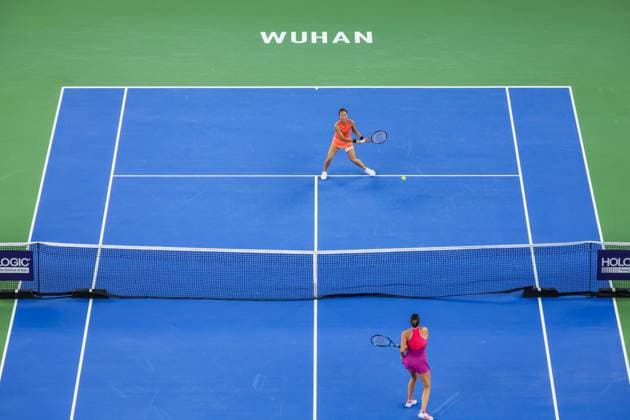 WUHAN, CHINA - OCTOBER 13: Zheng Qinwen of China competes in the Women s Singles Final match against Aryna Sabalenka on day nine of 2024 Wuhan Open at Optics Valley International Tennis Center on October 13, 2024 in Wuhan, Hubei Province of China.  Copyright: xVCGx 111523539492