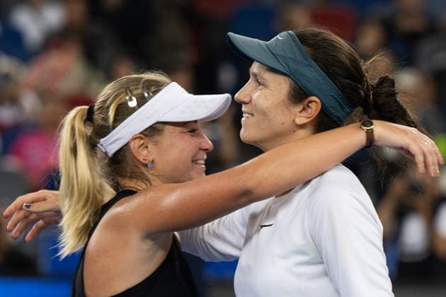 (241013) -- WUHAN, Oct. 13, 2024 -- Anna Danilina Irina Khromacheva (L) celebrate after winning the women s doubles final match between Anna Danilina of Kazakhstan Irina Khromacheva of Russia and Asia Muhammad Jessica Pegula of the United States at the 2024 Wuhan Open tennis tournament in Wuhan, central China s Hubei Province, Oct. 13, 2024. ) (SP)CHINA-WUHAN-TENNIS-WUHAN OPEN-WOMEN S DOUBLES-FINAL(CN) XiaoxYijiu 