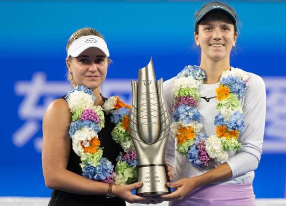 (241013) -- WUHAN, Oct. 13, 2024 -- Anna Danilina (R) Irina Khromacheva celebrate during the awarding ceremony of the women s doubles final match between Anna Danilina of Kazakhstan Irina Khromacheva of Russia and Asia Muhammad Jessica Pegula of the United States at the 2024 Wuhan Open tennis tournament in Wuhan, central China s Hubei Province, Oct. 13, 2024. ) (SP)CHINA-WUHAN-TENNIS-WUHAN OPEN-WOMEN S DOUBLES-FINAL(CN) XiaoxYijiu 